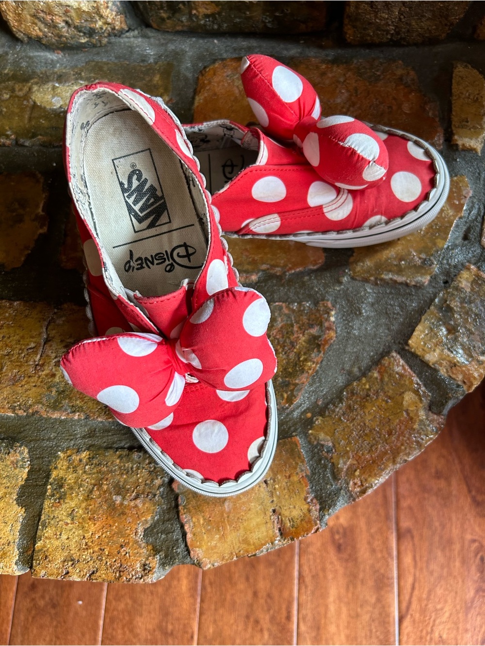 Vans in Minnie Mouse decor.